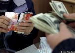 Первые торги Московской биржи в 2014 году: доллар растет, евро падает   