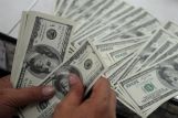МЭР планирует повысить прогноз по курсу рубля на 2014 год с нынешних 33,9 руб. за доллар